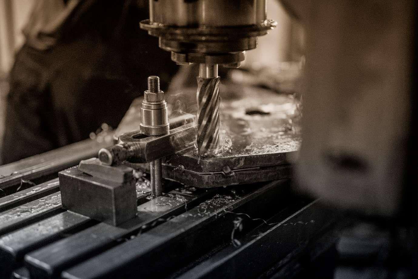 Precision drilling on a metal component — Asset Integrity & Industrial Maintenance